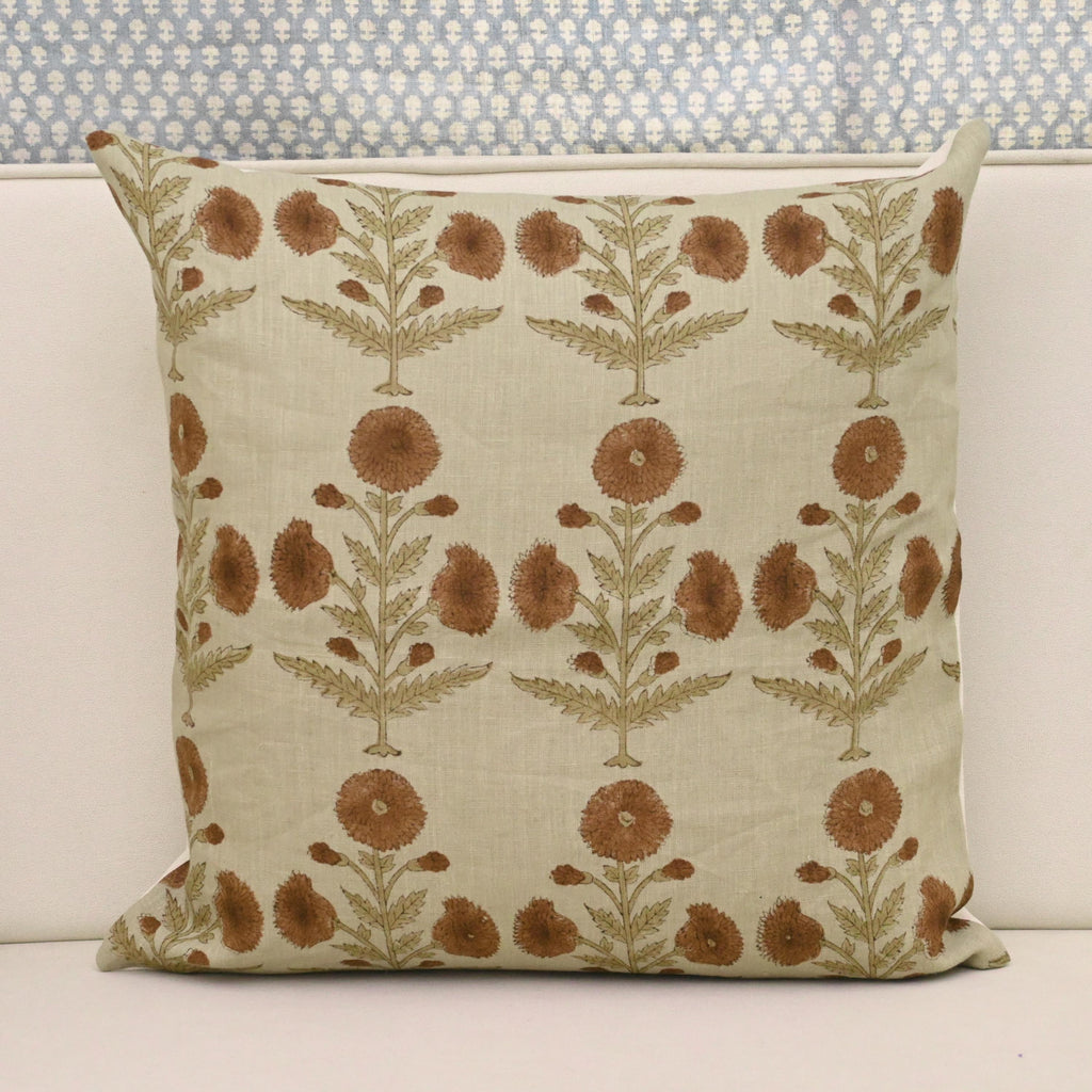 Rust terracotta dahlia hand block print linen pillow cover on natural background