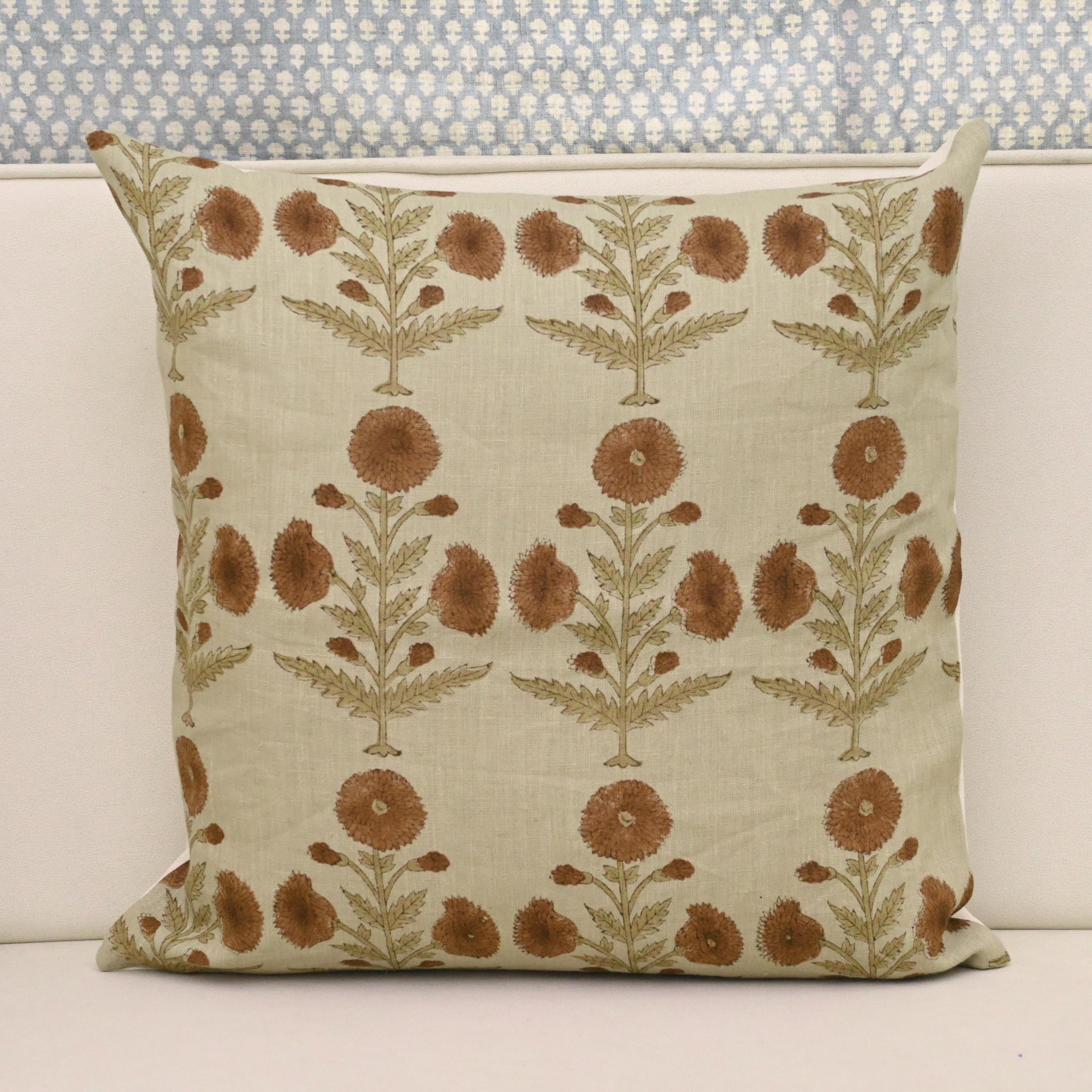 Rust terracotta dahlia hand block print linen pillow cover on natural background