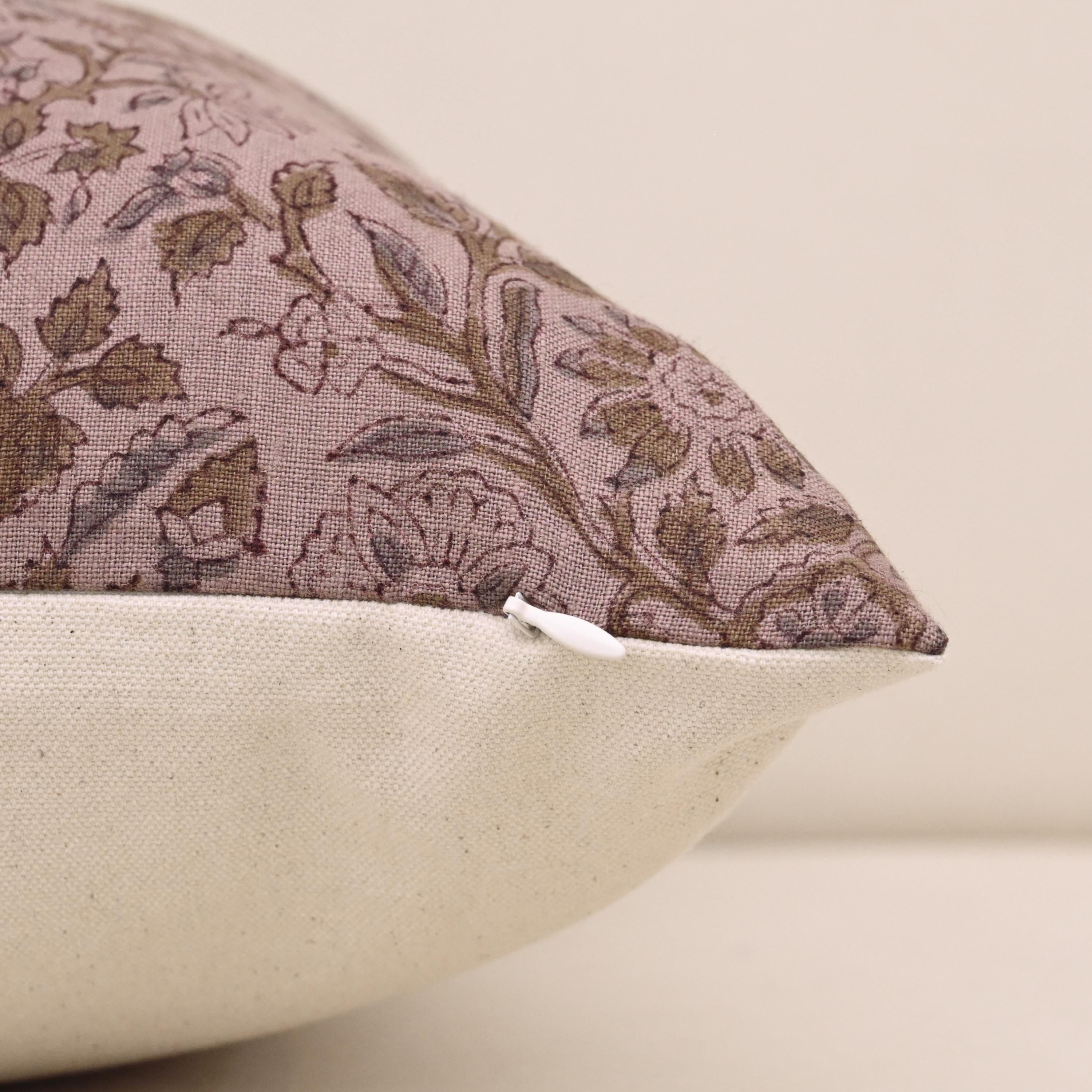 Rustica wild rose linen pillow cover styled on a sofa