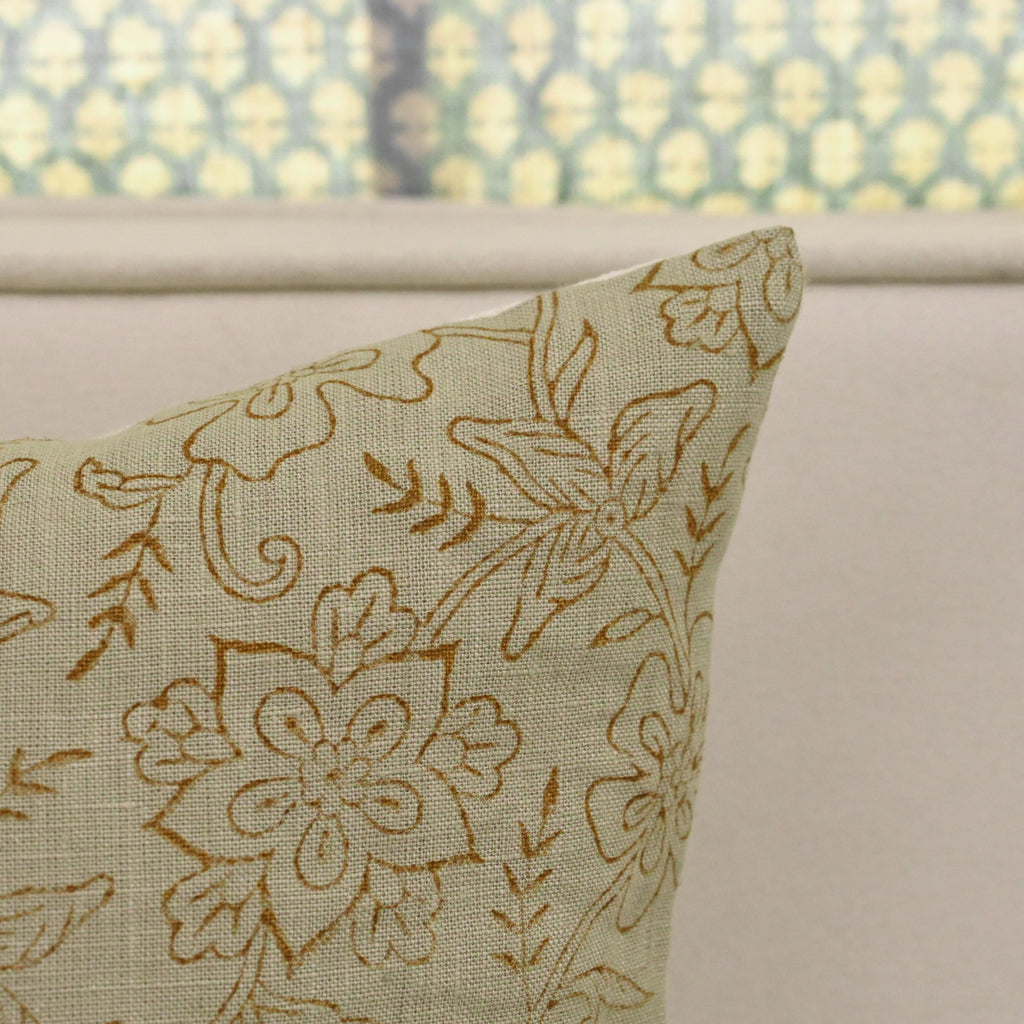 Corner detail of sage green chintz jaal linen pillow cover