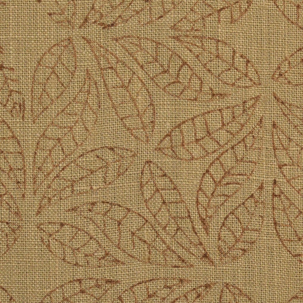 Close-up of the geometric leaf mandala block print detail on camel linen