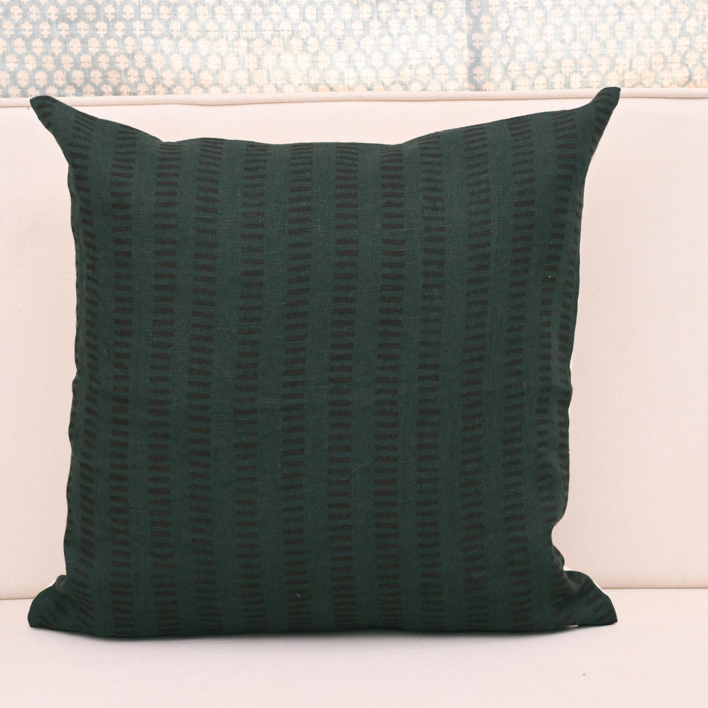 Hidden zipper closure on forest green geometric stripe cushion cover