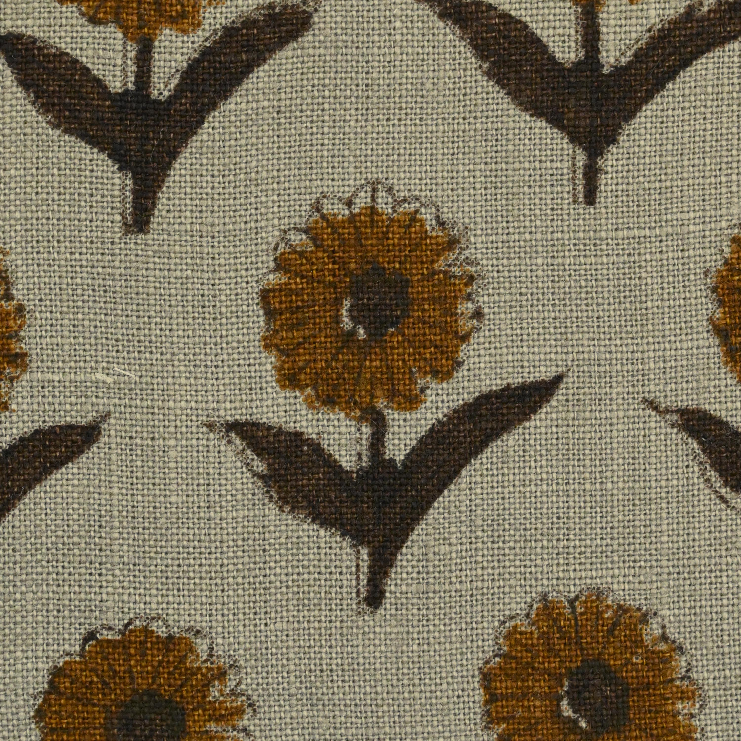 Mustard floral hand block print linen pillow cover styled on a sofa