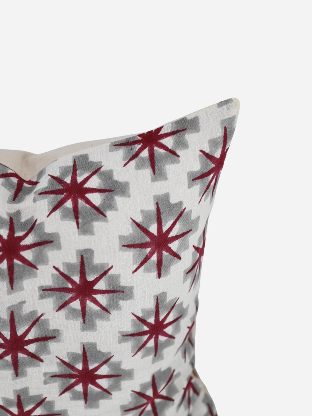 Close-up of the burgundy star medallion hand block print on linen