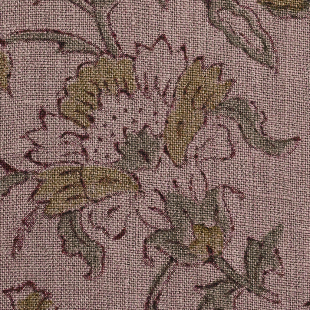 Hidden zipper and corner detail of mauve floral linen pillow cover