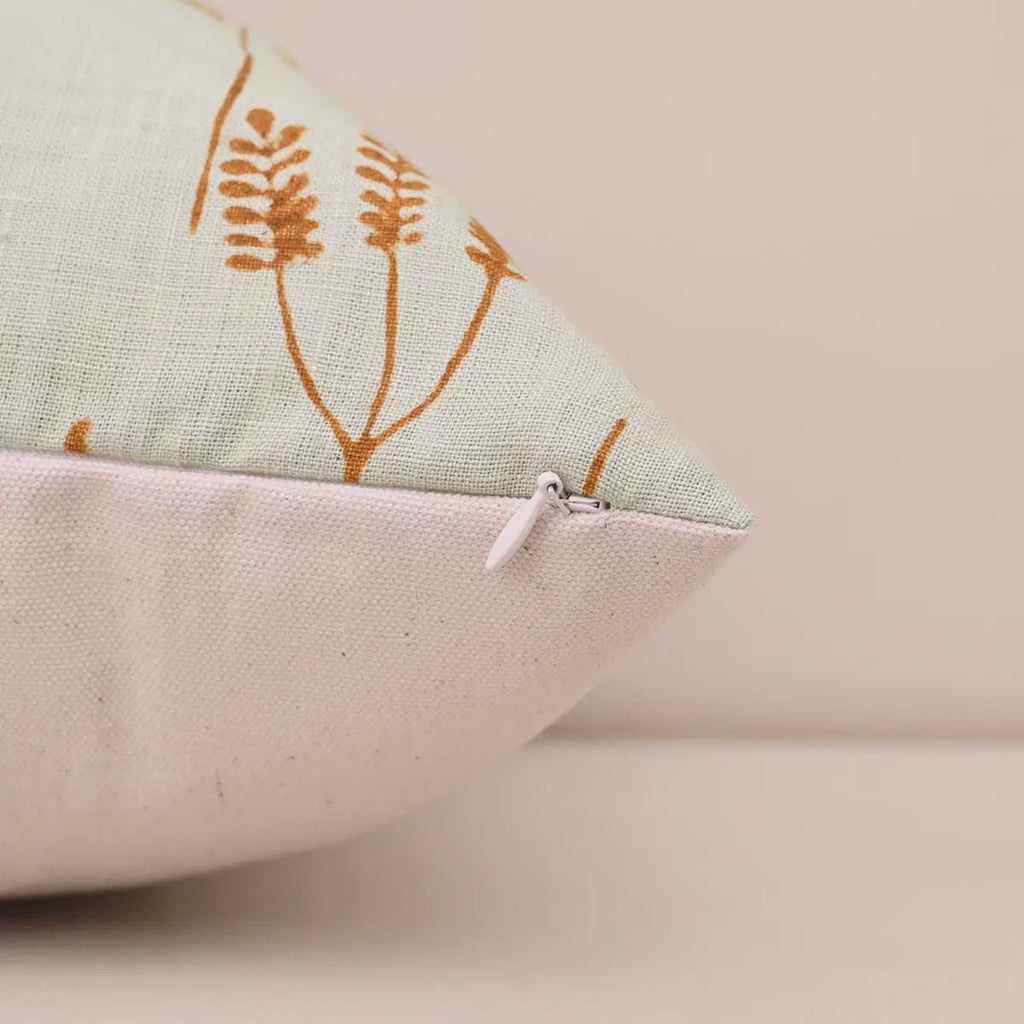 Rust botanical linen pillow cover corner and zipper detail