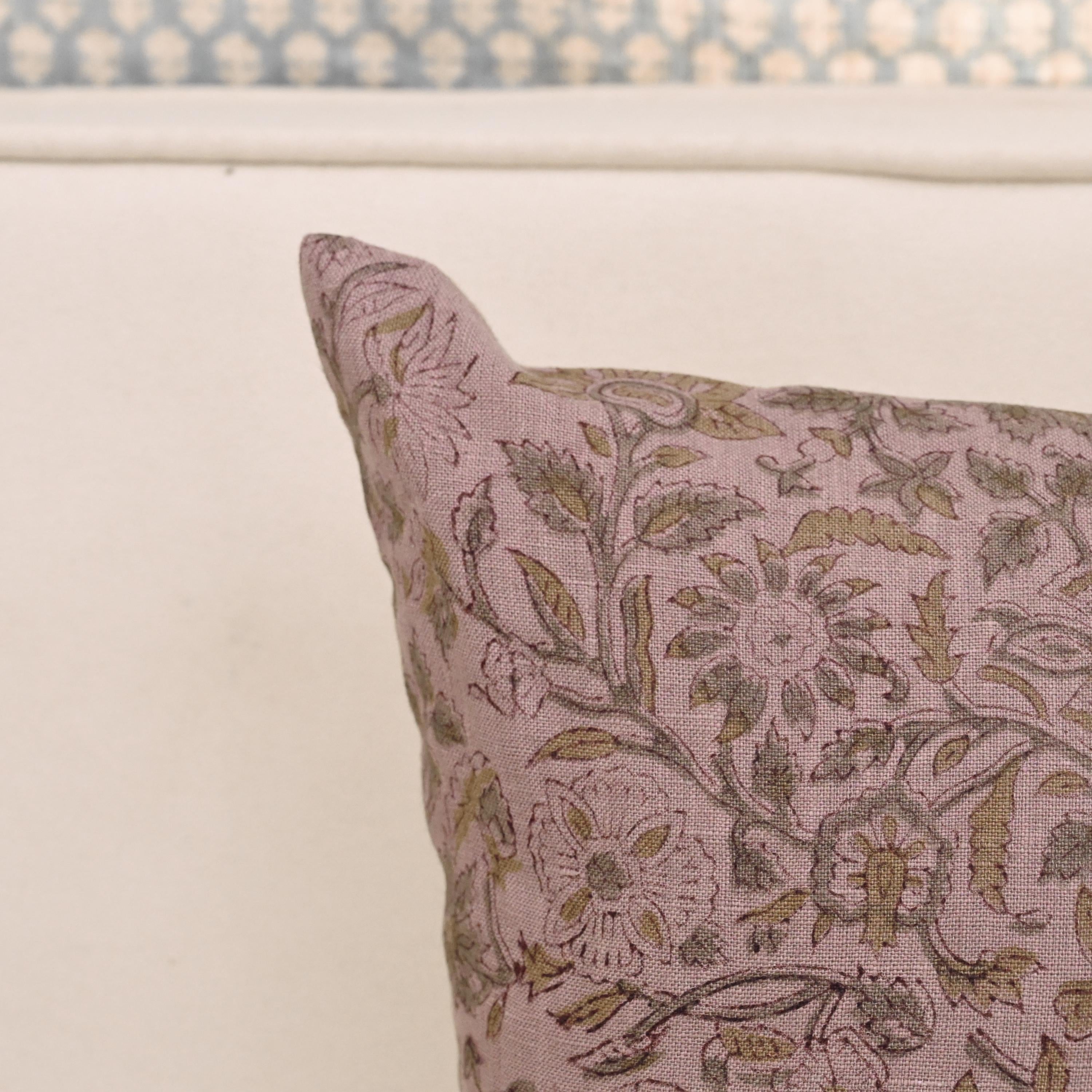Vine floral linen pillow cover styled on a sofa