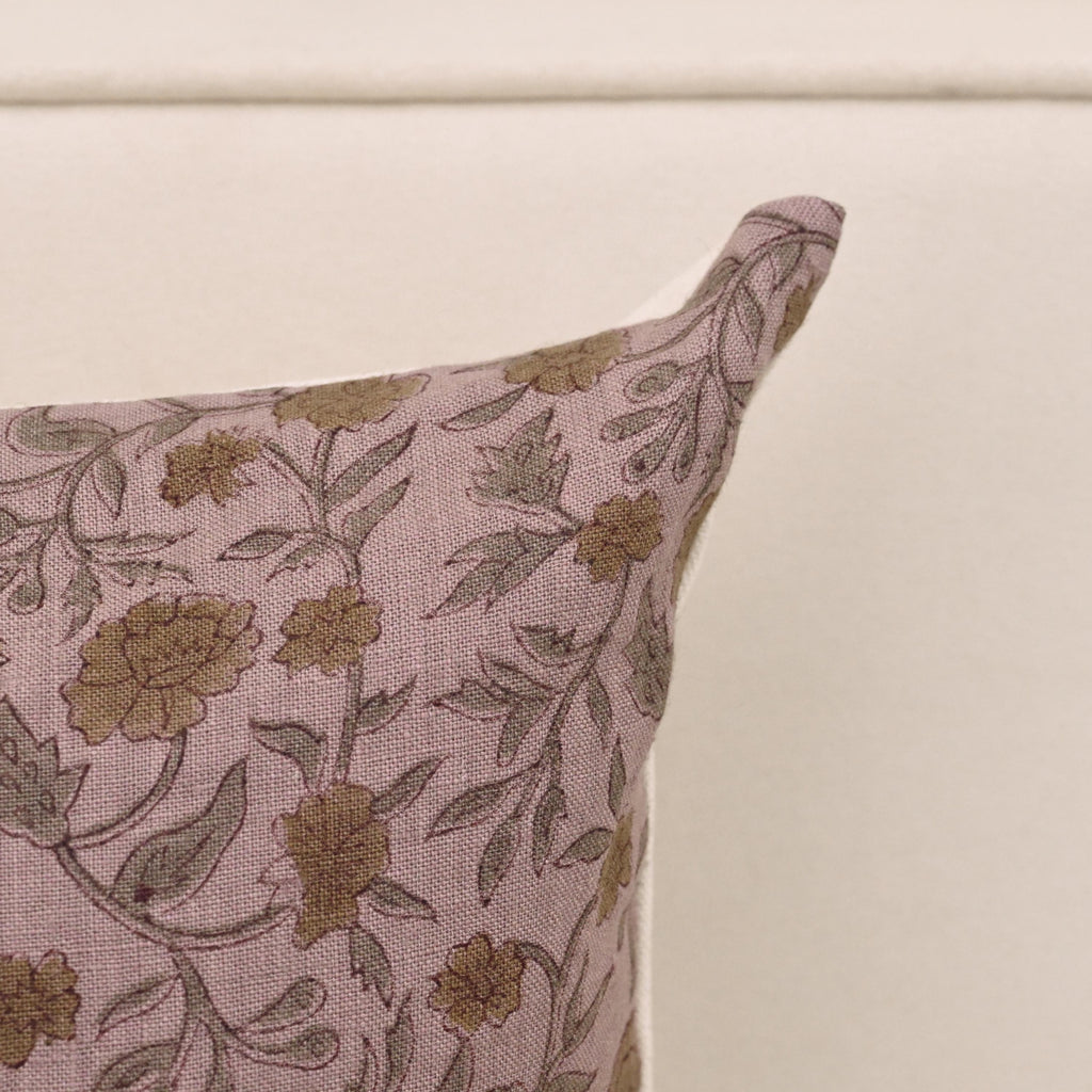 Heritage rose vine linen pillow cover styled on a sofa