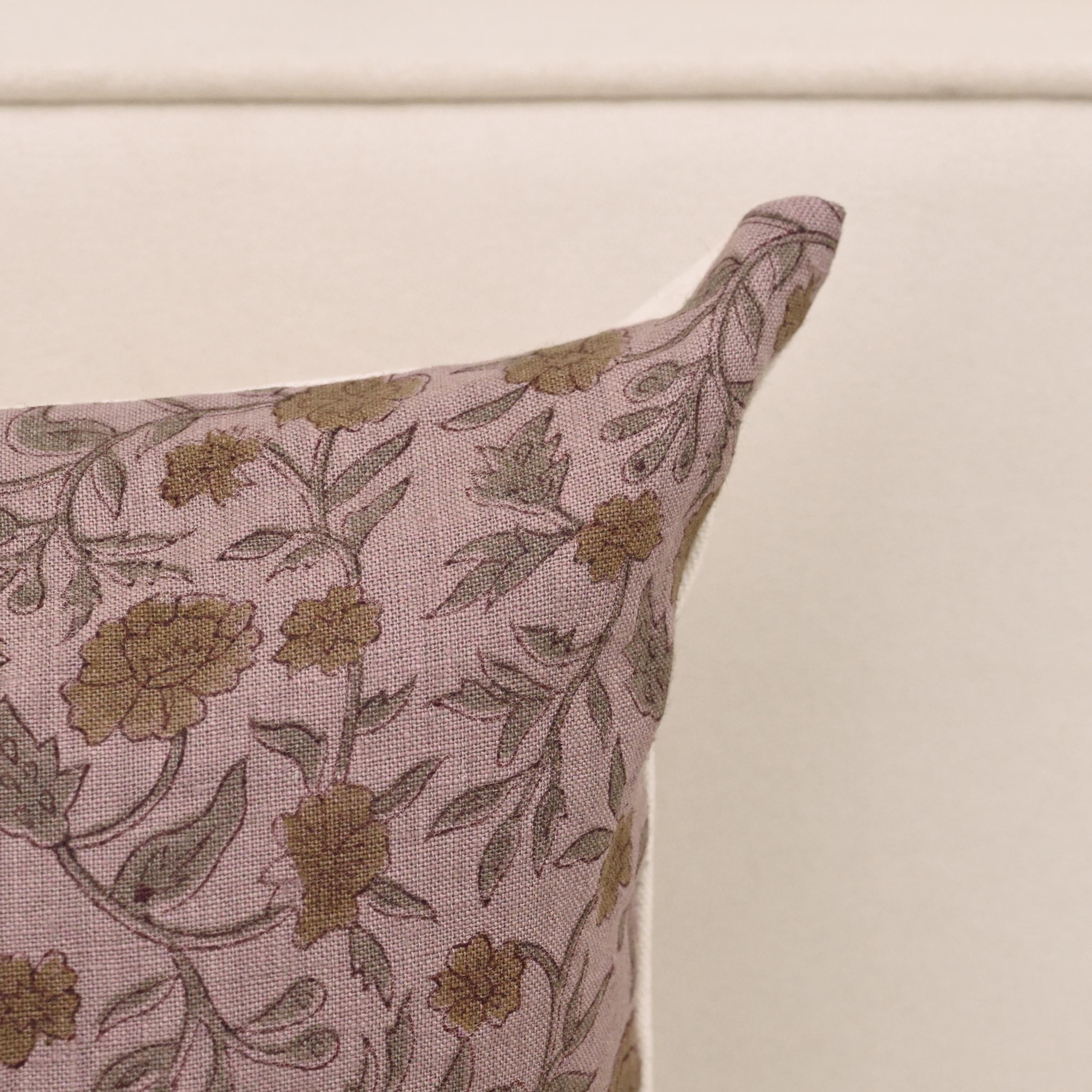Heritage rose vine linen pillow cover styled on a sofa