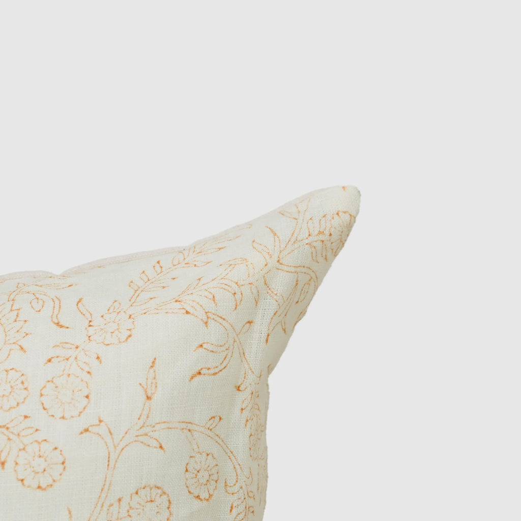 Close-up of ivory floral vine print on linen pillow cover