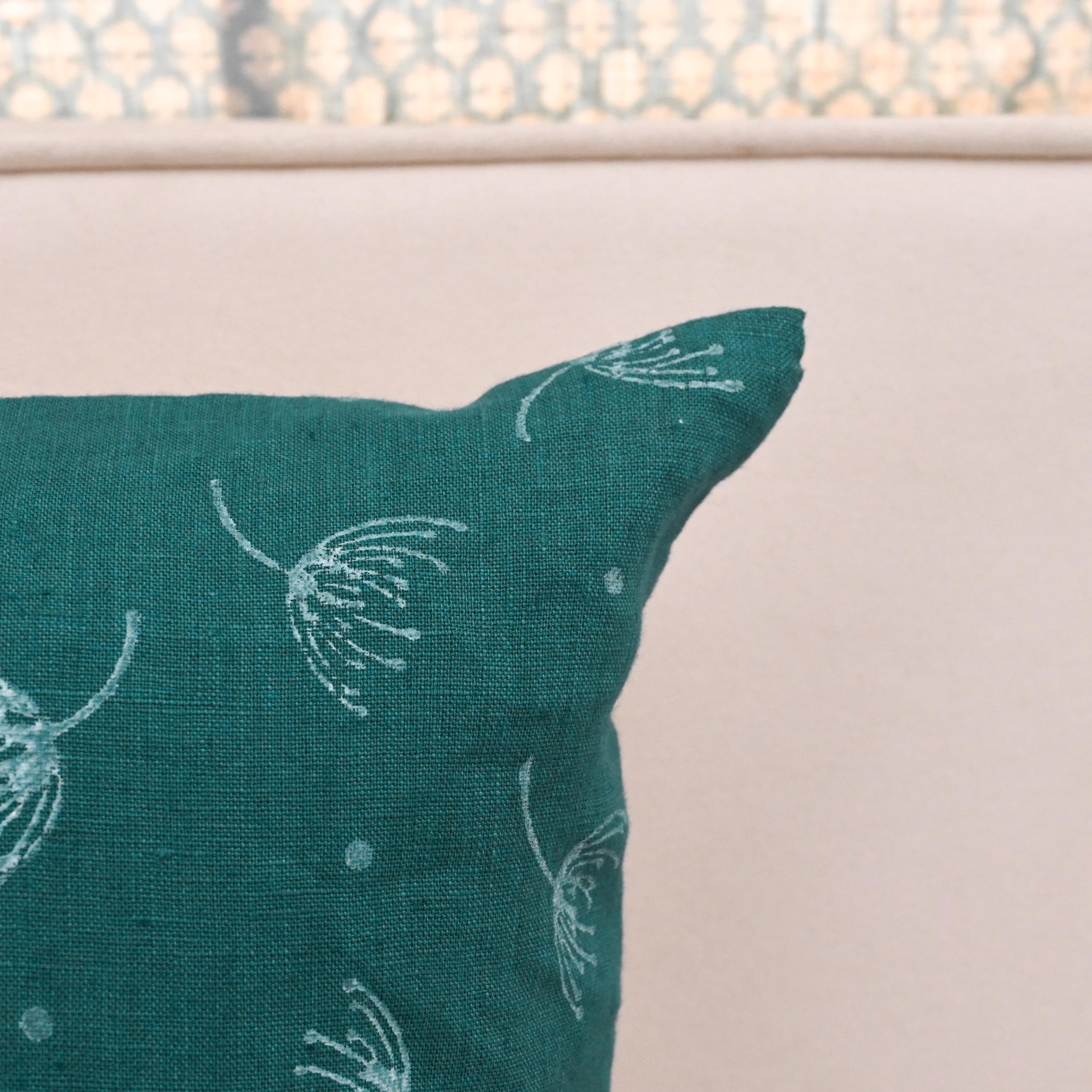 Corner detail of teal wild meadow sprigs linen pillow cover