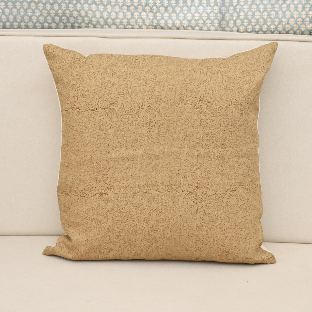 Mustard camel linen pillow cover with a fine hand block printed ditsy floral vine, front view