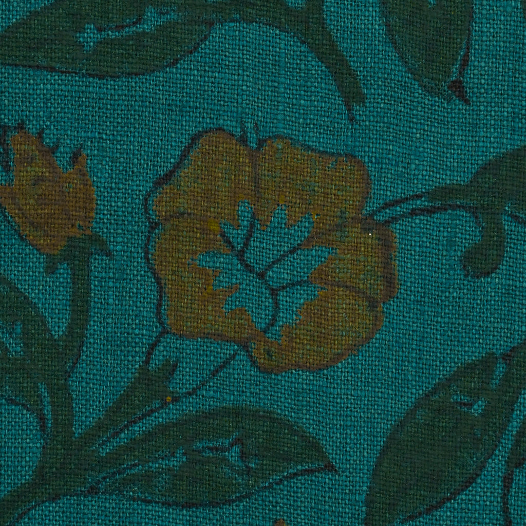 Front view of teal wild rose hand block print cushion cover