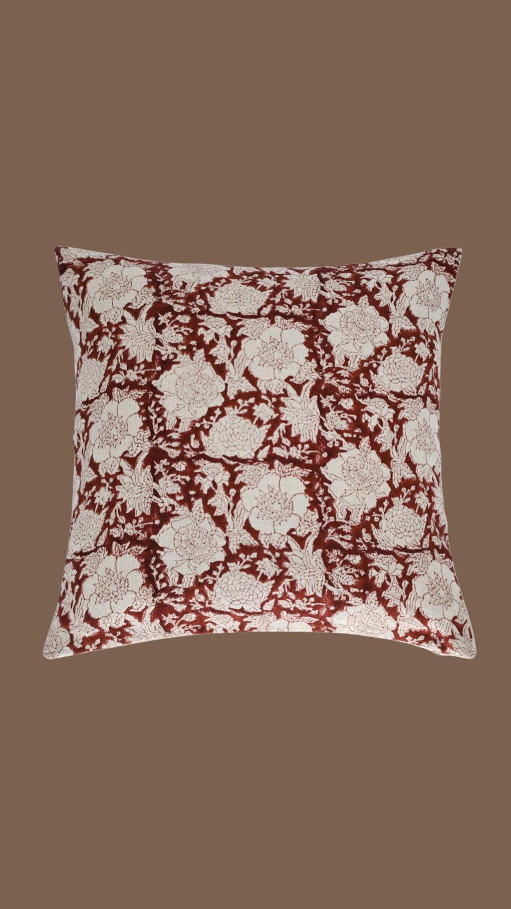 Close-up of the rust floral trellis hand block print on linen