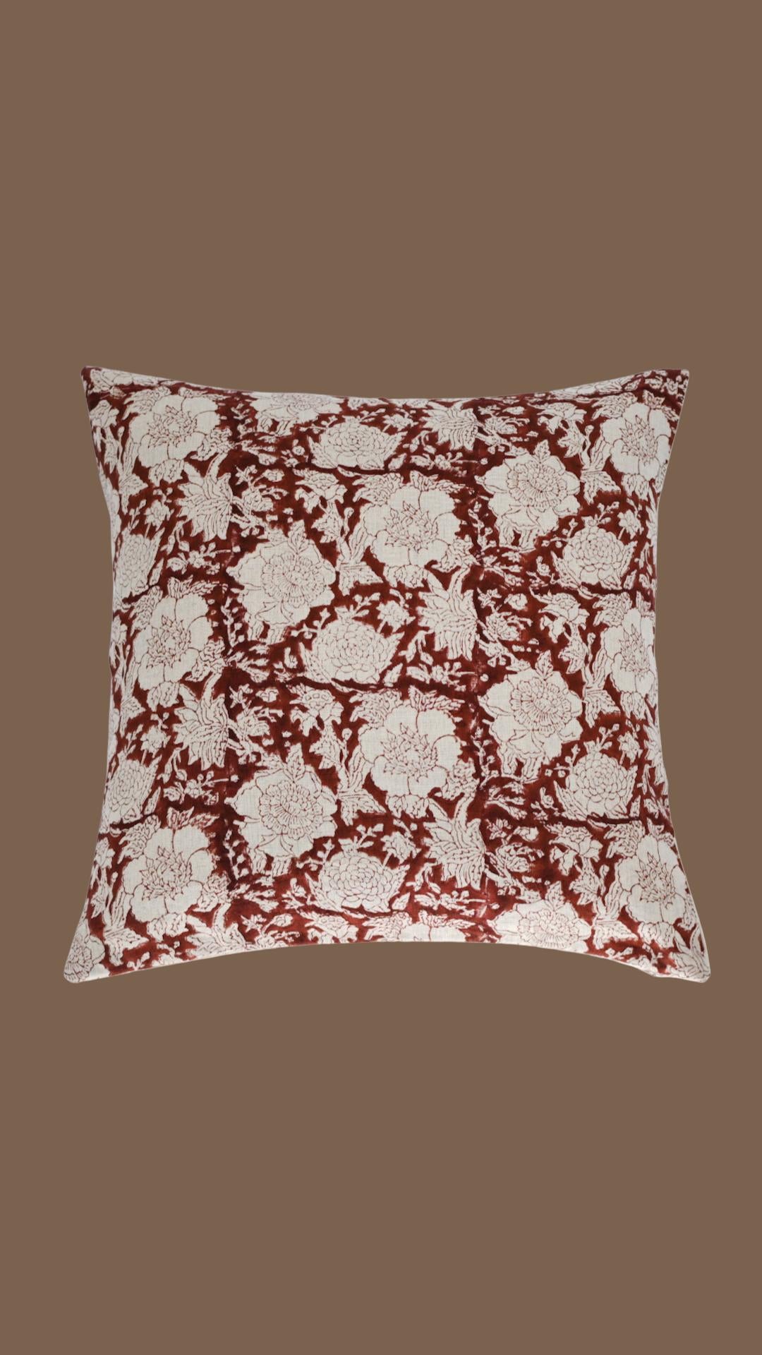 Close-up of the rust floral trellis hand block print on linen