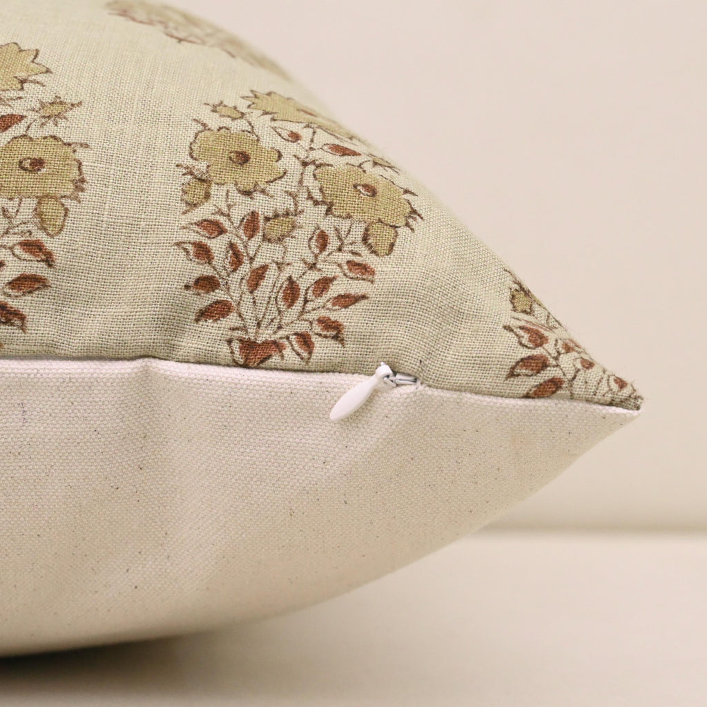 Close-up of buta floral block print detail on ivory linen cushion cover