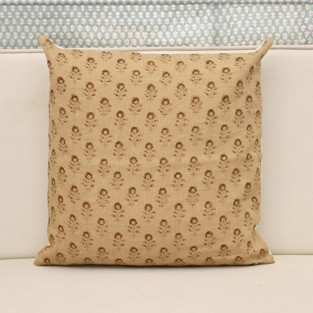 Camel linen pillow cover with hand block printed chestnut brown sunflower buti motif, front view