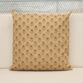 Camel linen pillow cover with hand block printed chestnut brown sunflower buti motif, front view