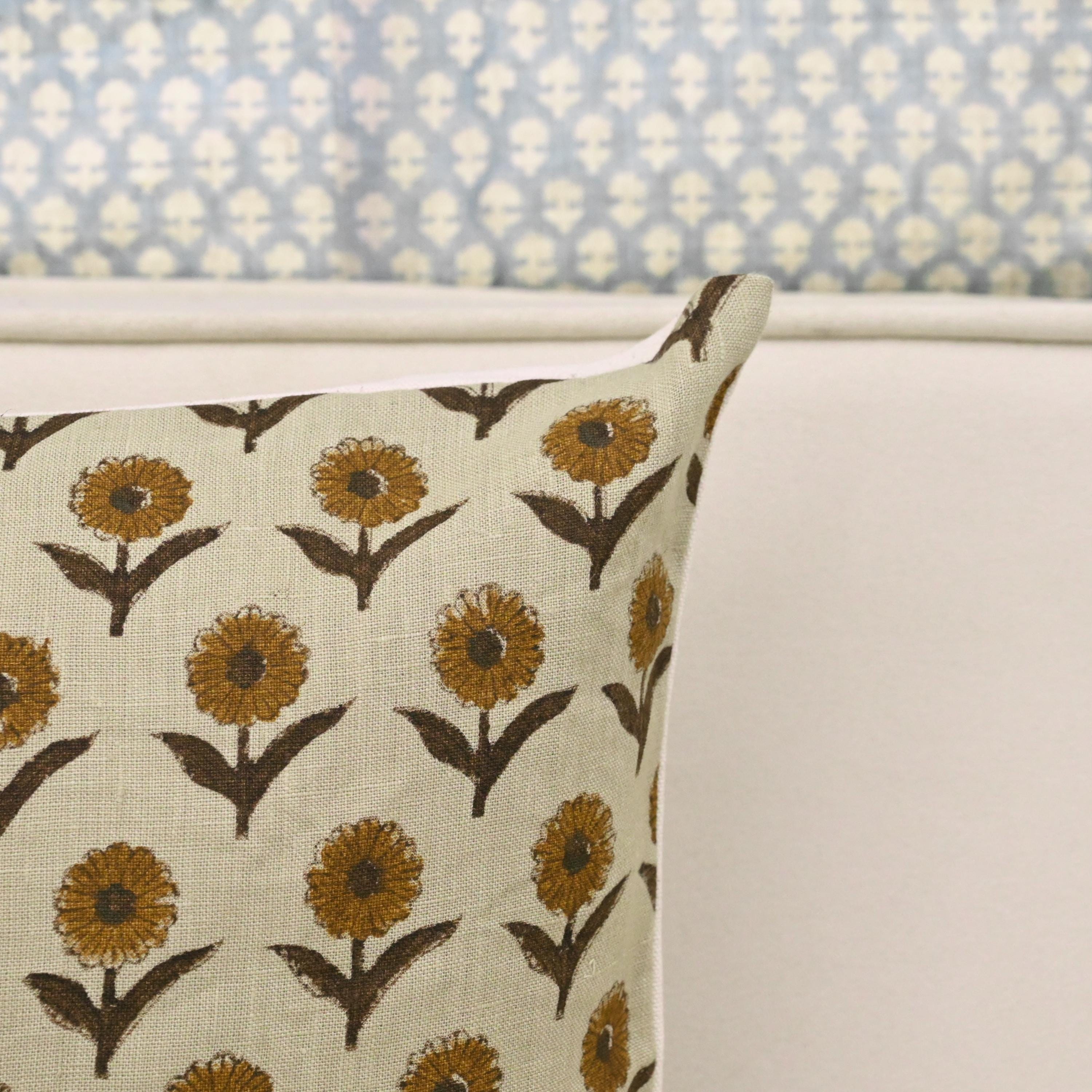 Mustard floral linen pillow cover, corner and hidden zipper detail