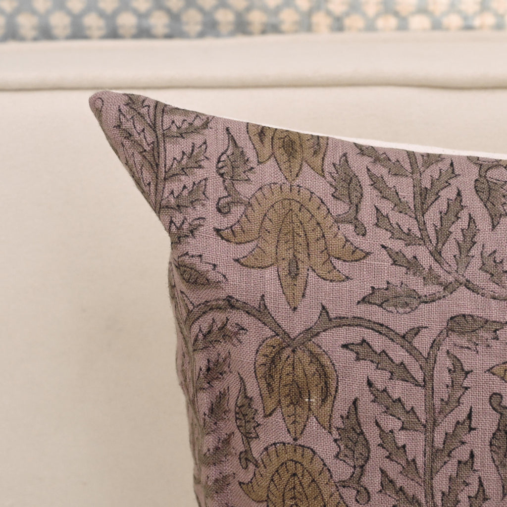 Mauve charcoal damask linen pillow cover styled on a sofa