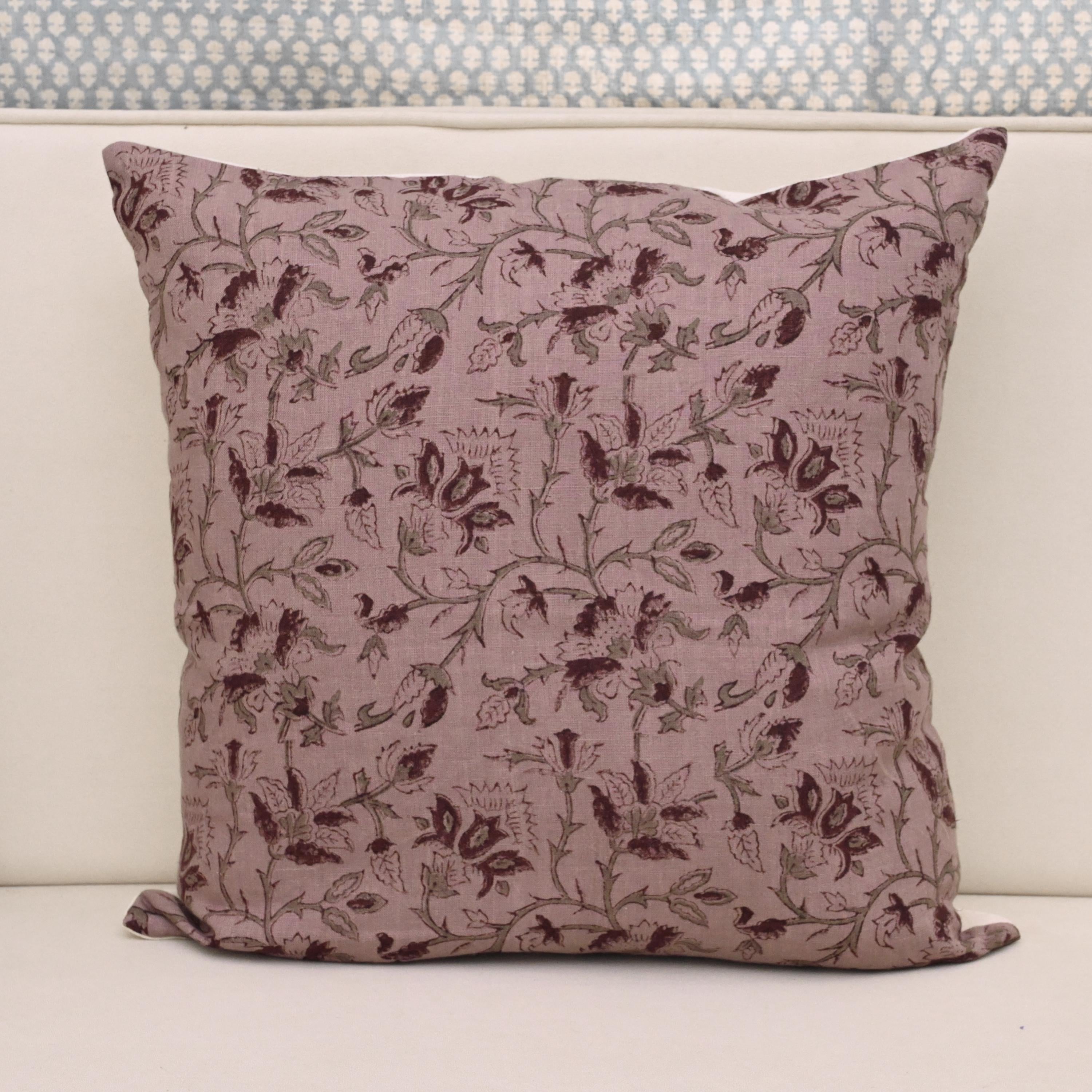 Deep wine burgundy floral hand block print linen pillow cover on mauve background