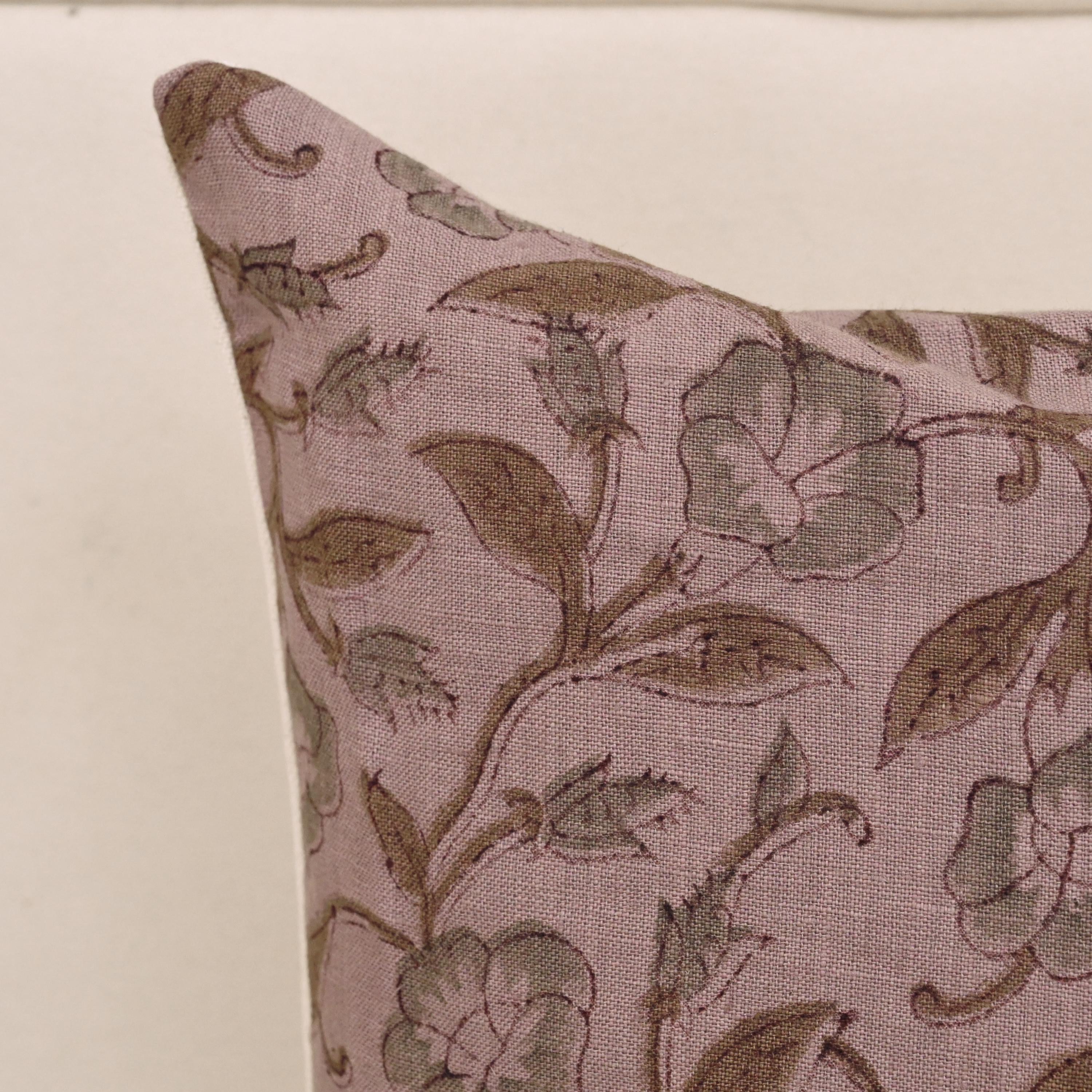 Willow sage floral linen pillow cover styled on a sofa