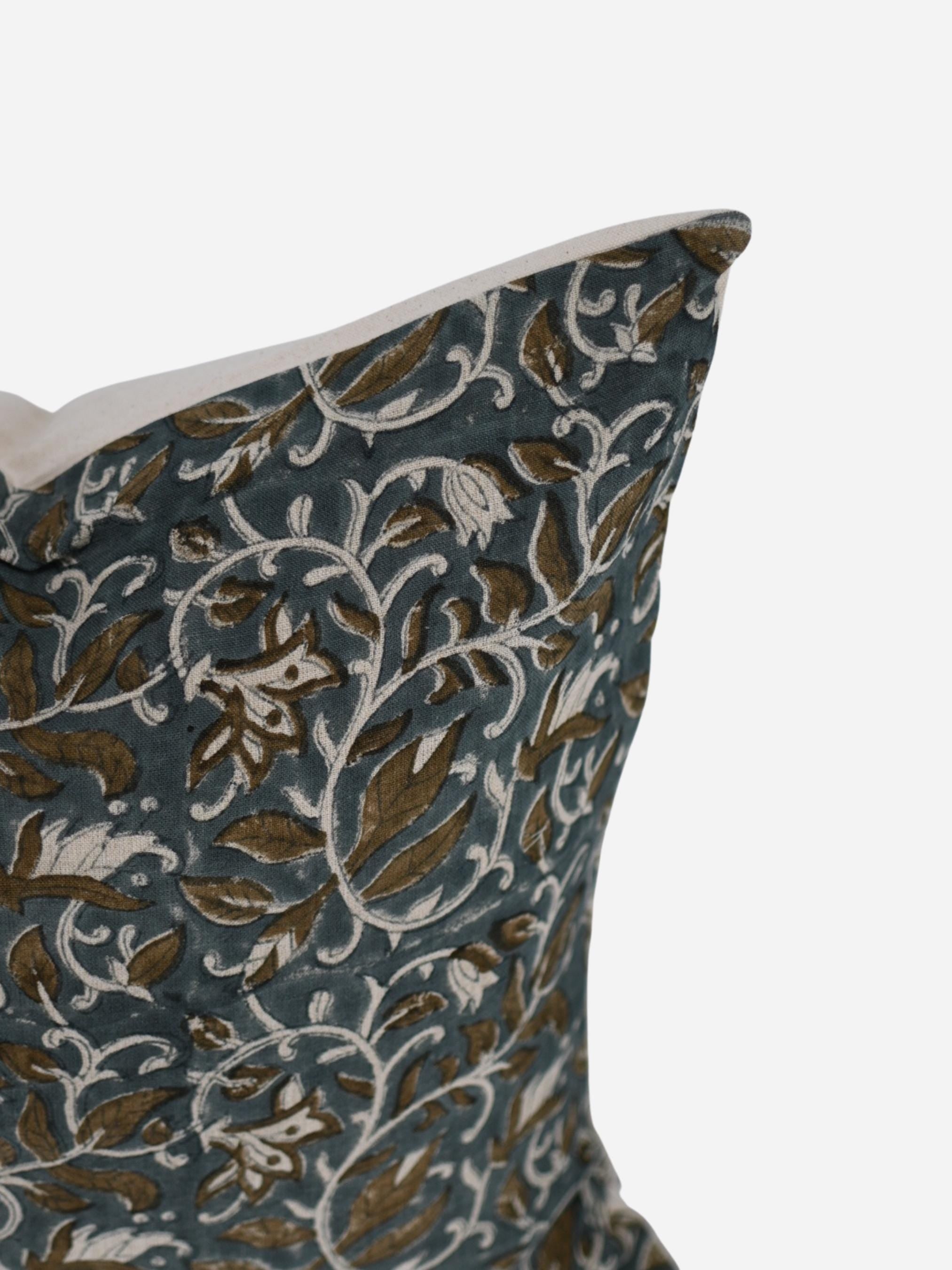Close-up of the slate blue paisley vine hand block print on linen