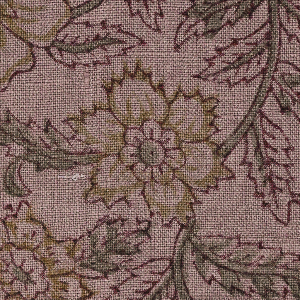 Hidden zipper and corner detail of mauve gold floral linen pillow cover