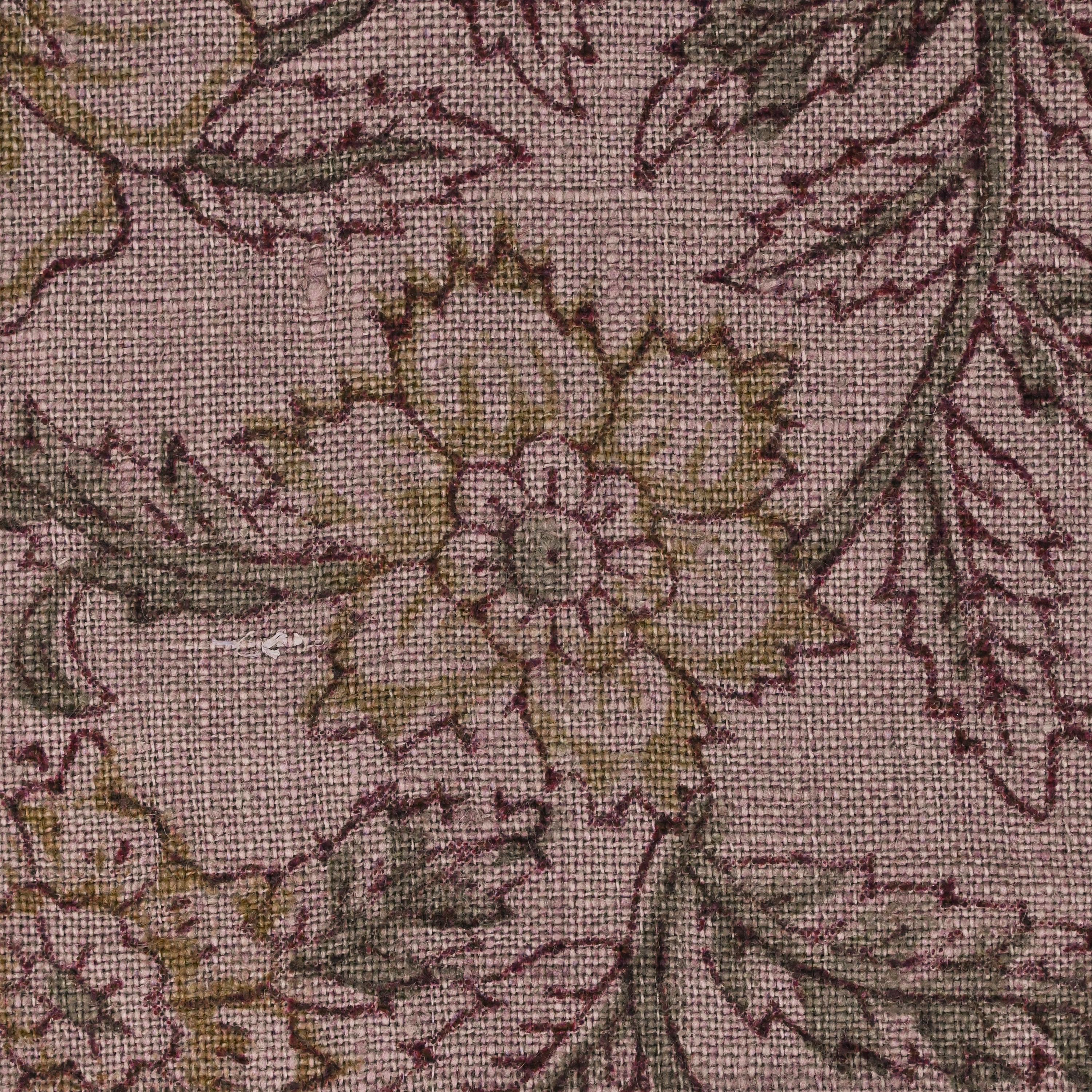 Hidden zipper and corner detail of mauve gold floral linen pillow cover