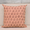 Rust brown floral bouquet hand block print linen pillow cover on peach background