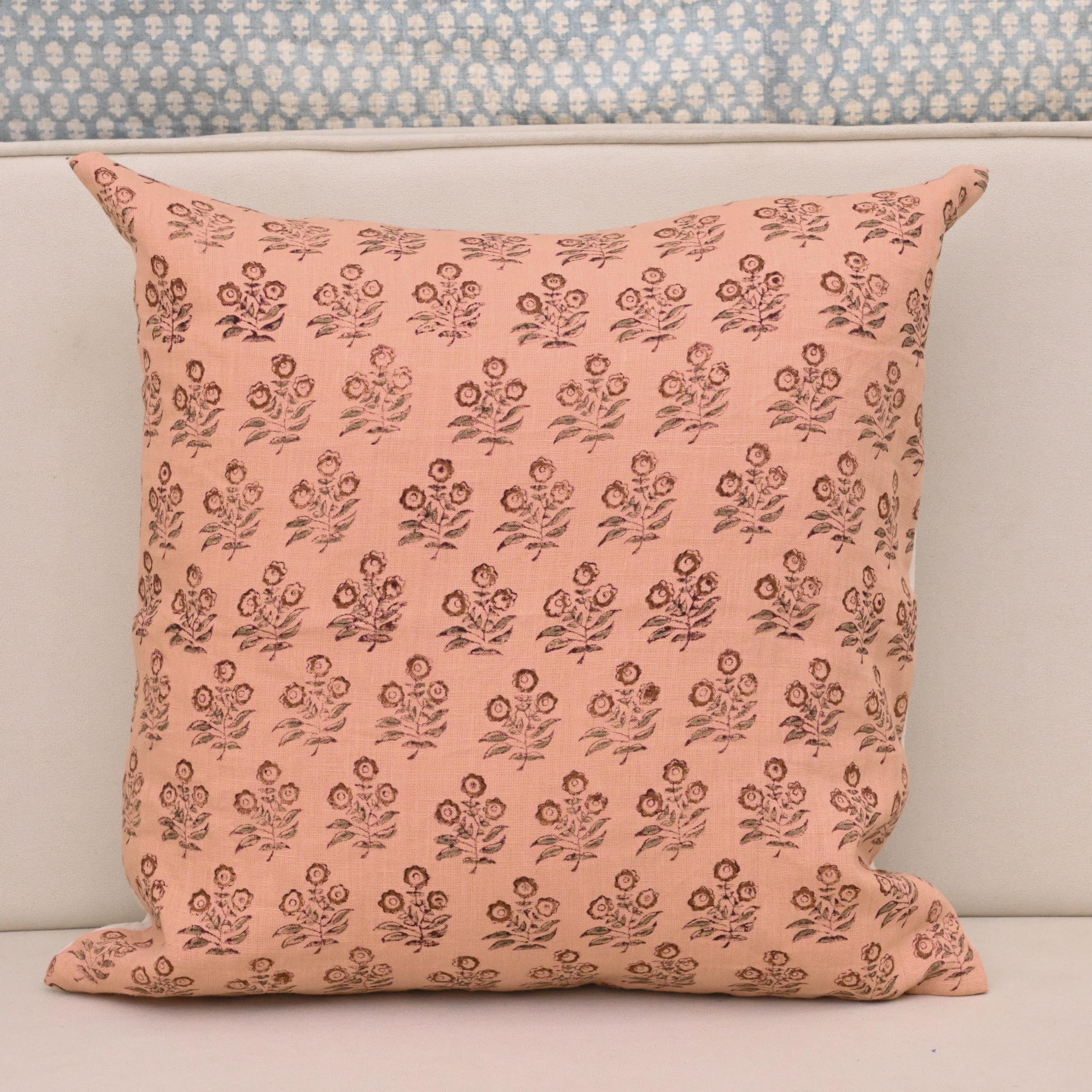 Rust brown floral bouquet hand block print linen pillow cover on peach background