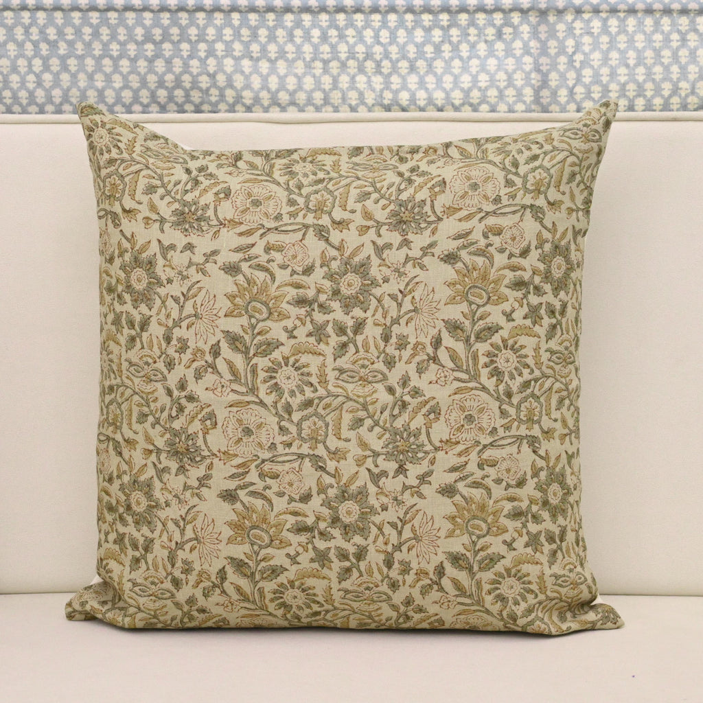 Sage green and rust brown jaal hand block print linen pillow cover on natural background