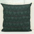 Forest green chintz bud block print linen pillow cover styled on a sofa