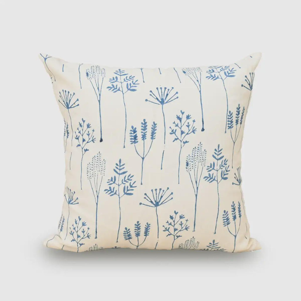 Denim blue folk-art botanical hand block print linen pillow cover on cream background