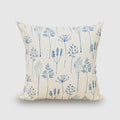 Denim blue folk-art botanical hand block print linen pillow cover on cream background