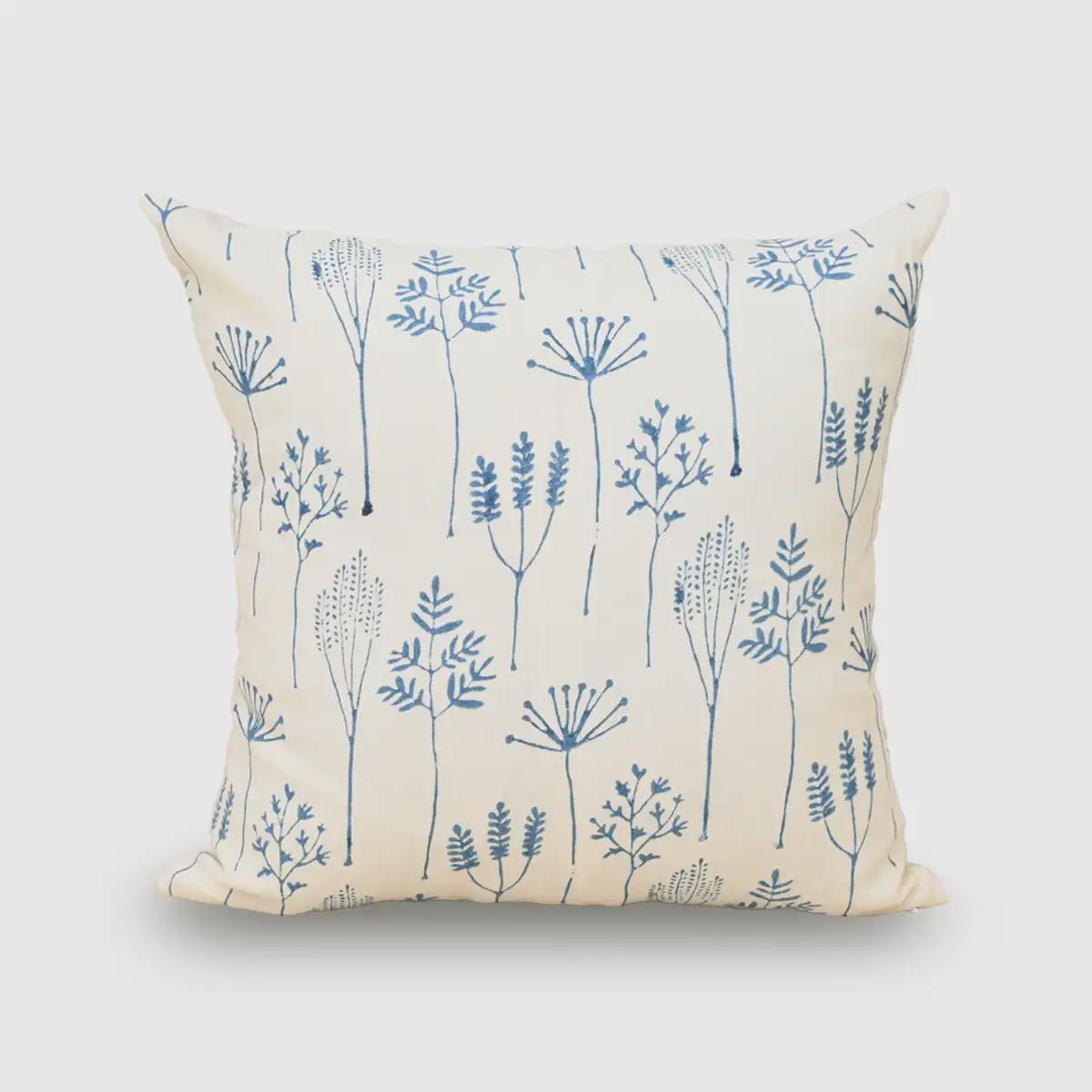 Denim blue folk-art botanical hand block print linen pillow cover on cream background