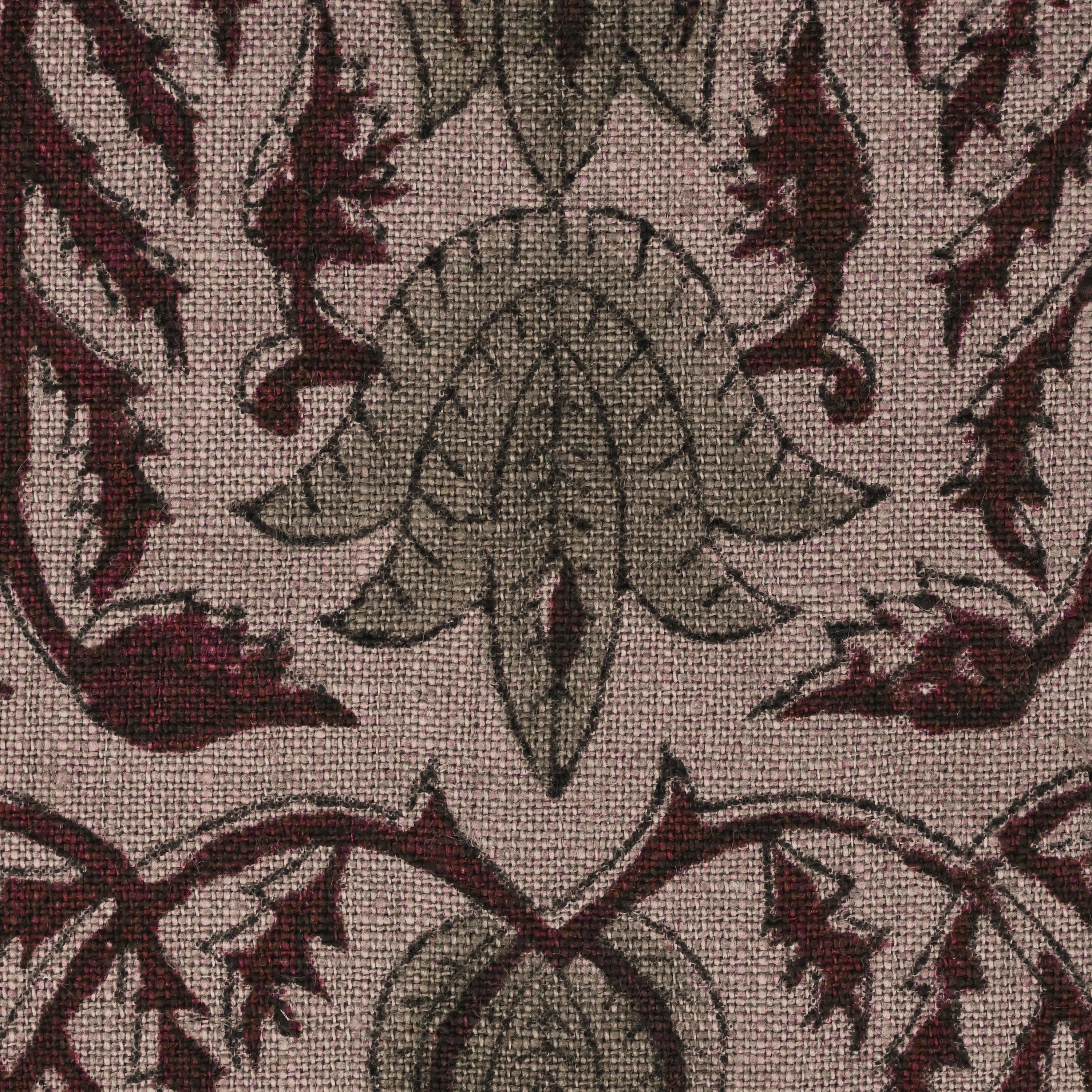 Close-up of the damask lotus vine block print in wine and sage on mauve linen