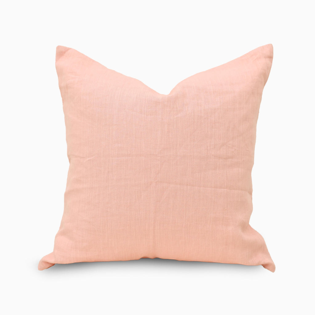 Blush pink 100% linen pillow cover, front view on white background
