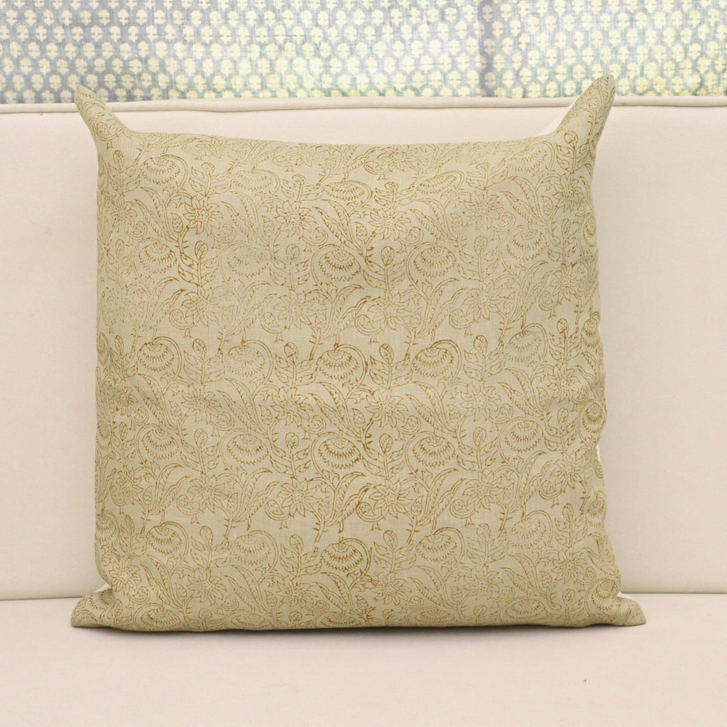 Sage green chintz vine block print linen pillow cover styled on a sofa