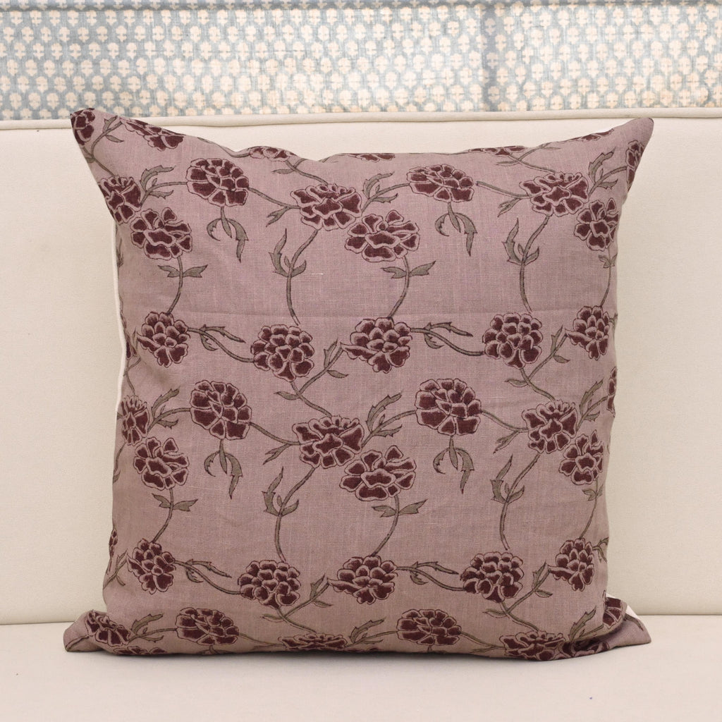 Dusty mauve linen pillow cover with hand block printed burgundy carnation vine, front view