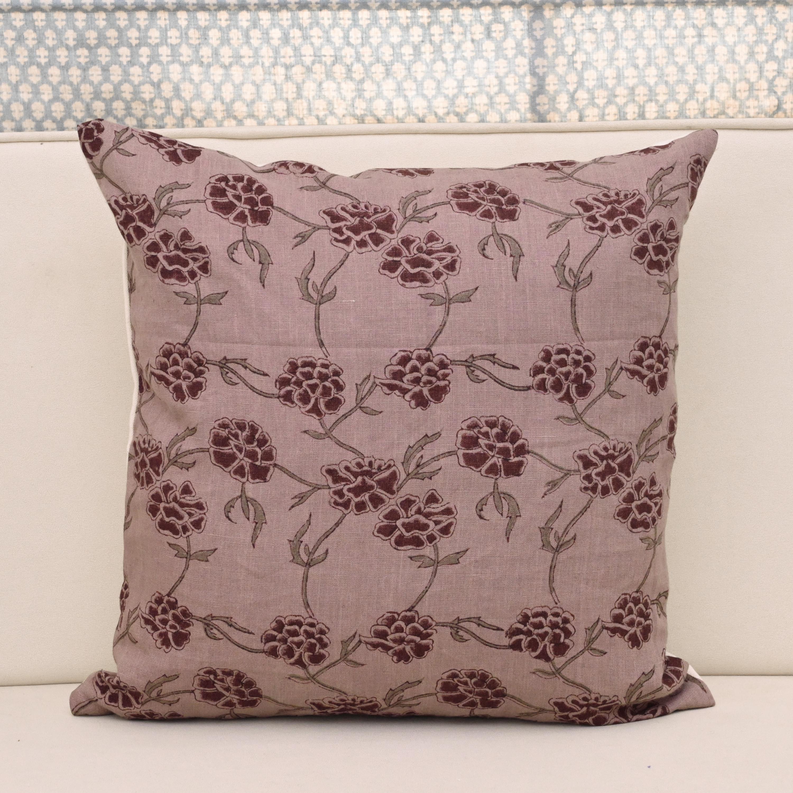 Dusty mauve linen pillow cover with hand block printed burgundy carnation vine, front view