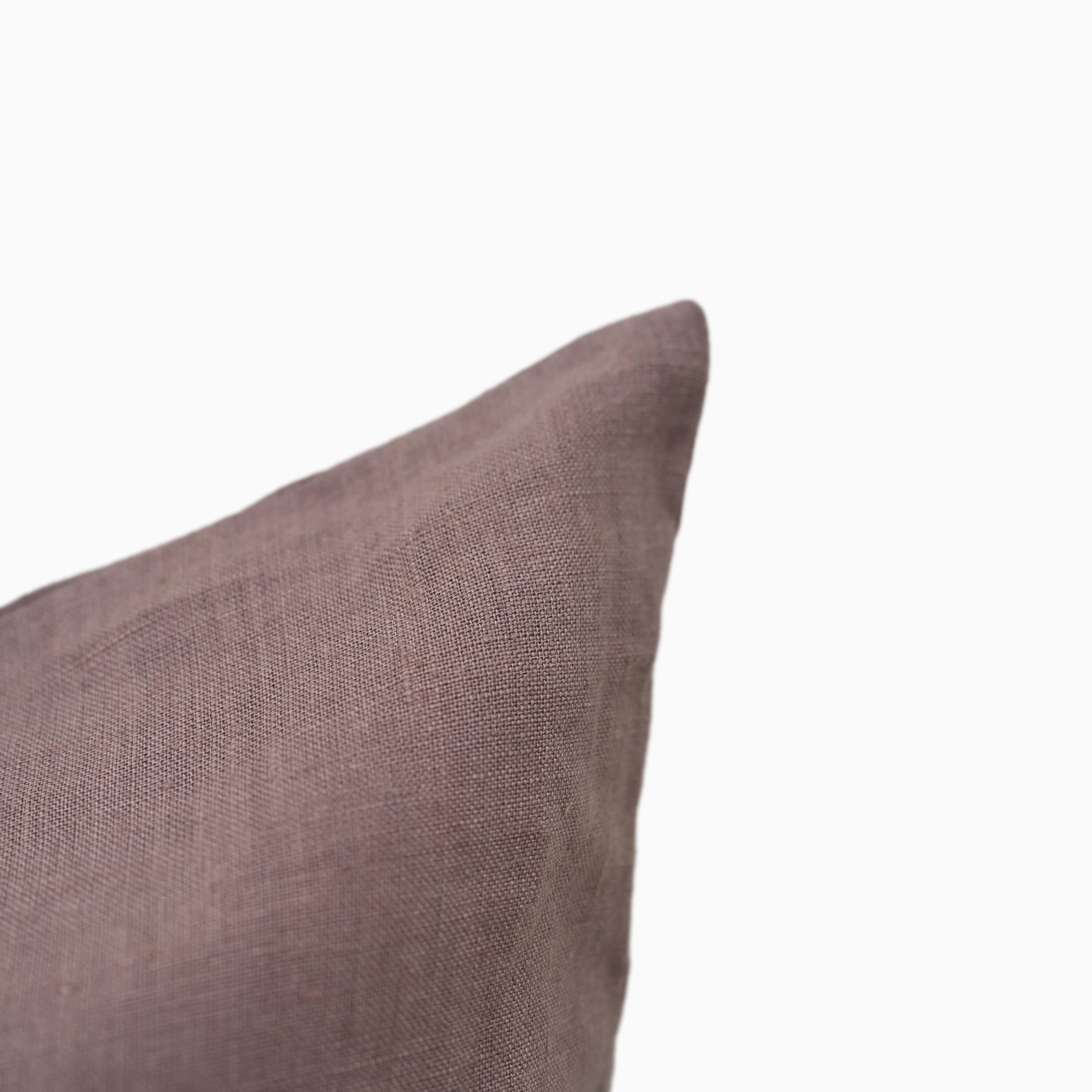 Close-up of purple linen pillow cover fabric weave and hidden zipper