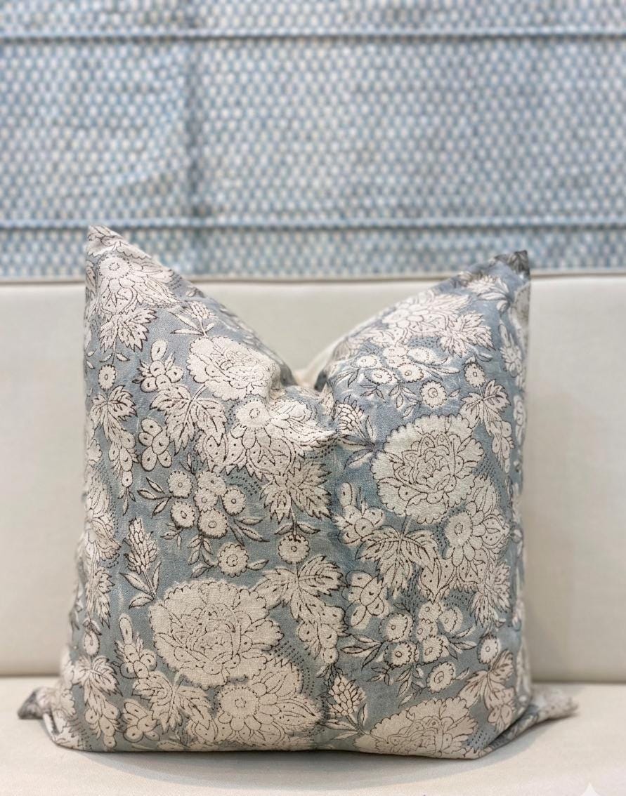 Blue-gray floral linen pillow cover corner and hidden zipper detail
