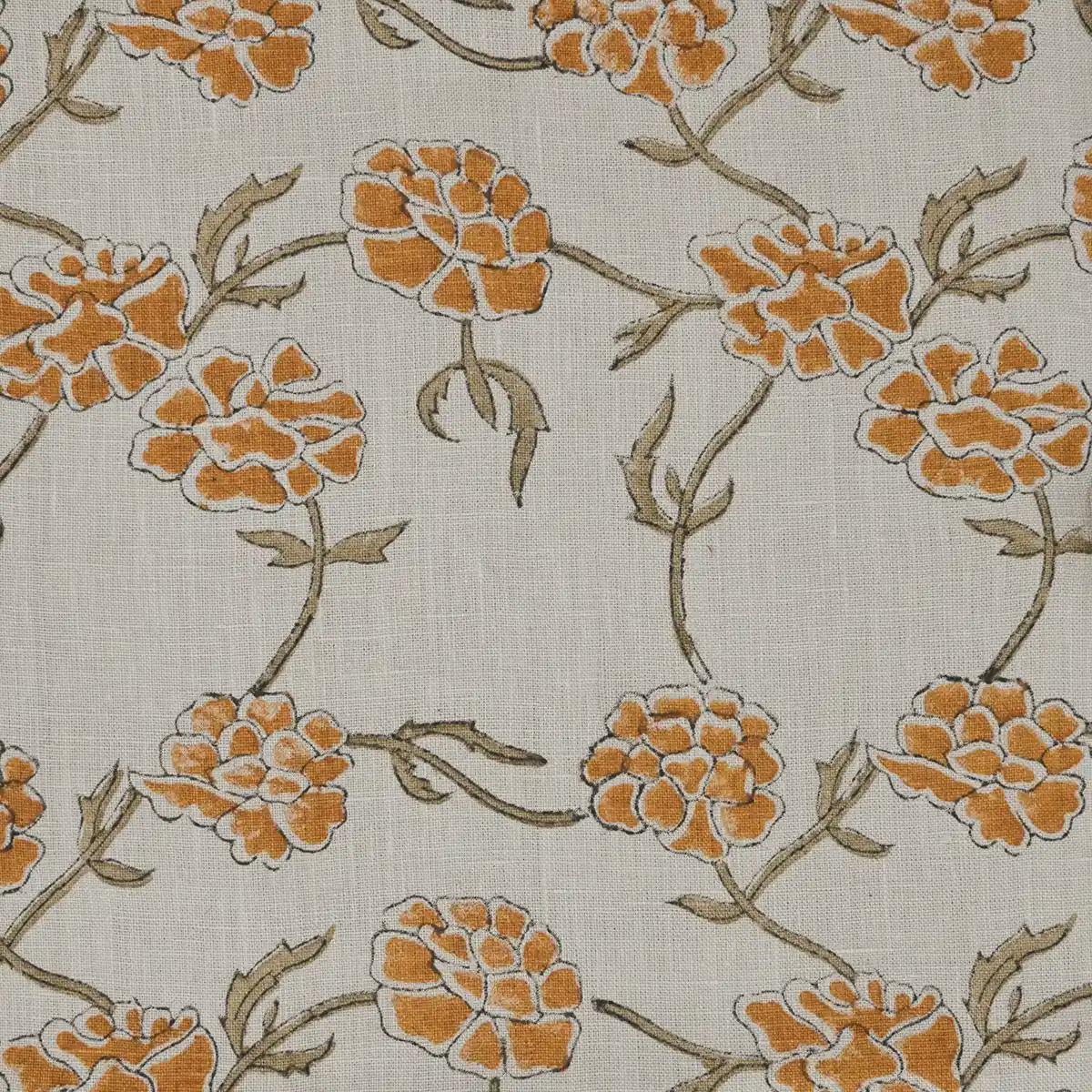 Close-up of marigold floral hand block print detail on linen pillow cover
