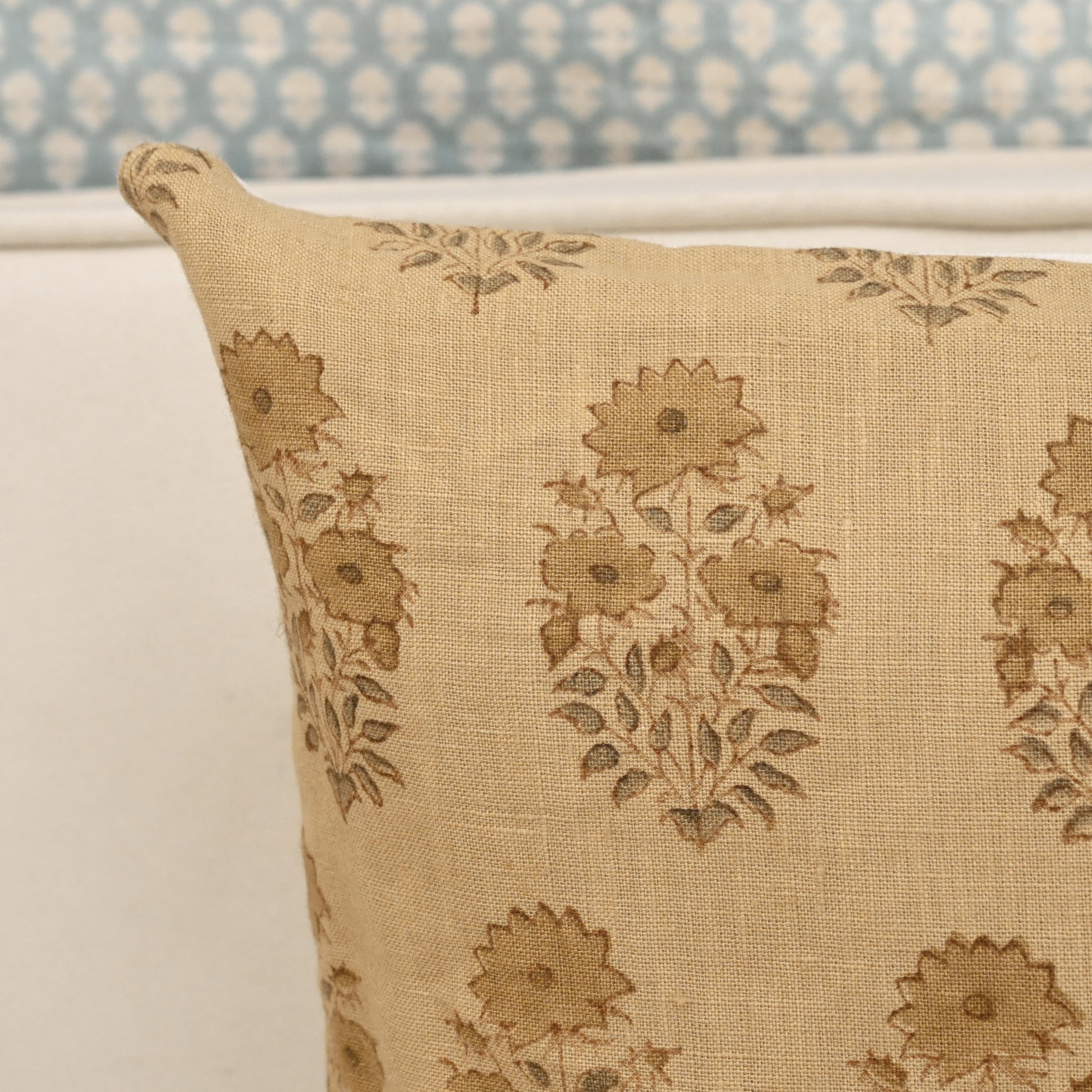 Bloom floral buti linen pillow cover styled on a sofa