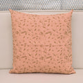 Golden floral hand block print linen pillow cover on blush pink background