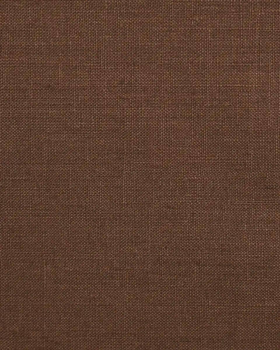 Solid brown linen pillow cover, fabric texture close-up