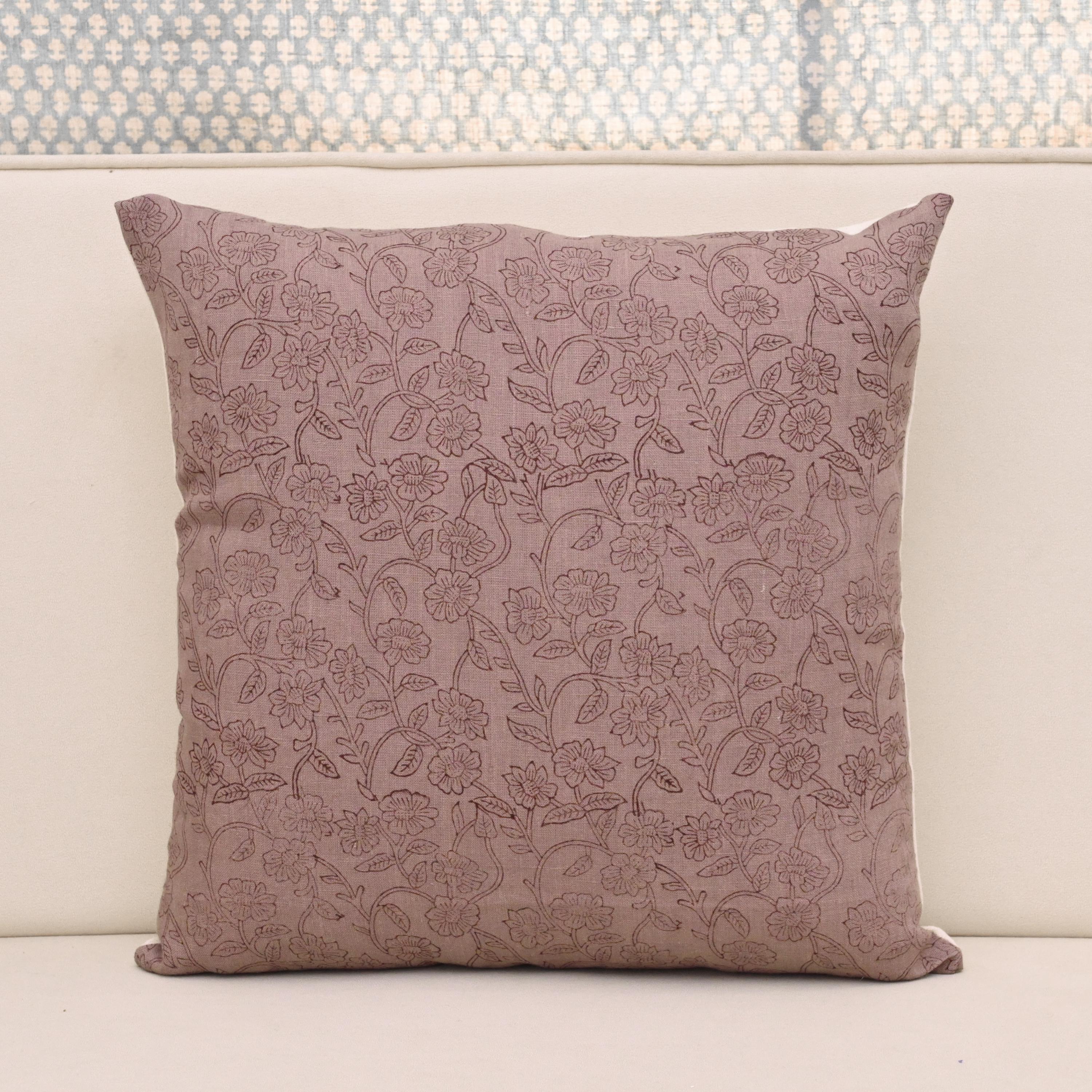 Dusty mauve linen pillow cover with a fine wine ditsy floral vine hand block print, front view