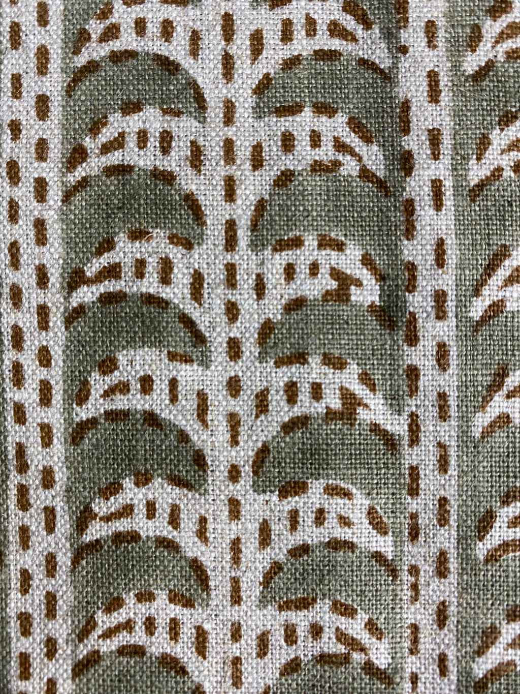 Tan scalloped stripe linen pillow cover, corner and zipper detail