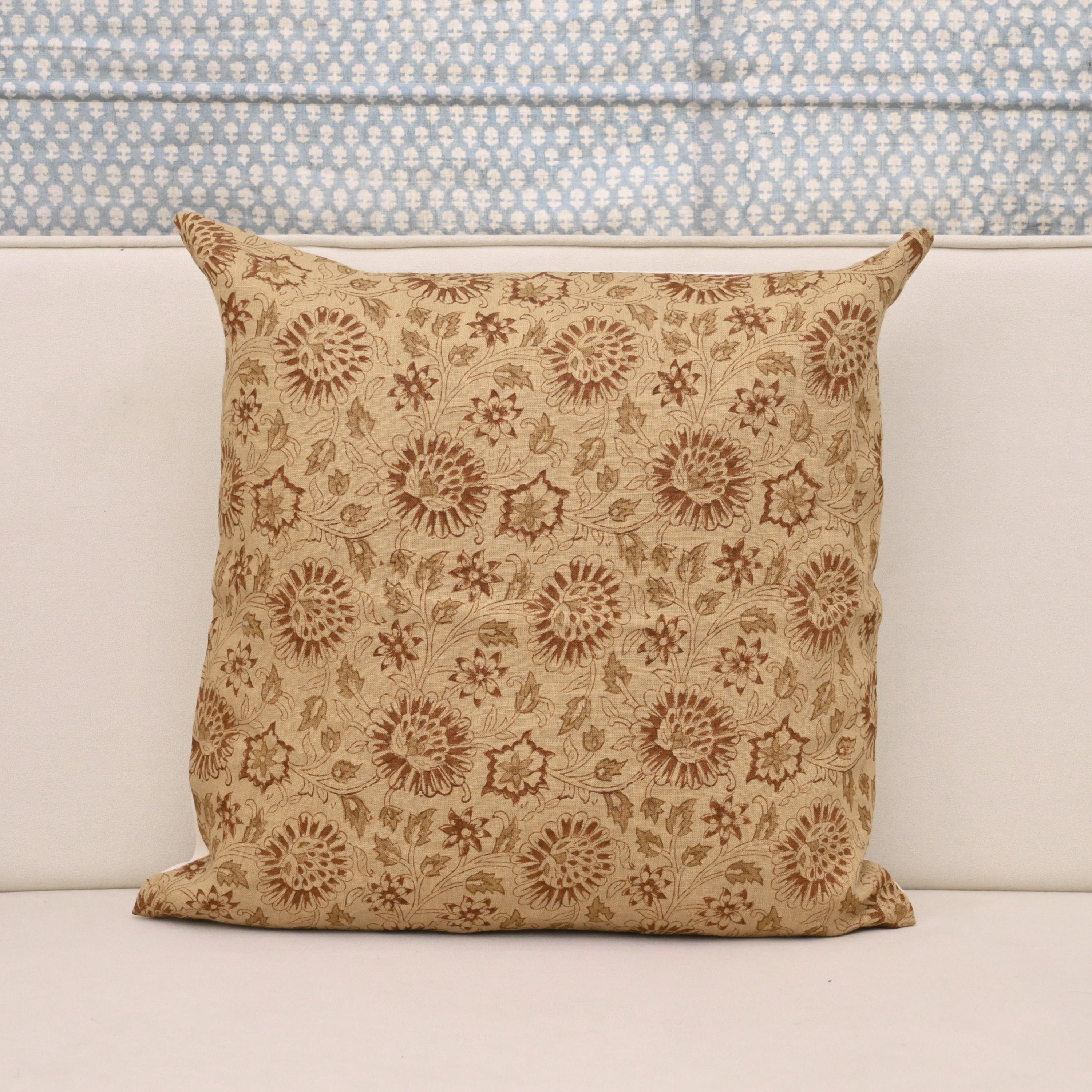 Camel linen pillow cover with hand block printed Jaipuri chrysanthemum vine in chestnut brown, front view